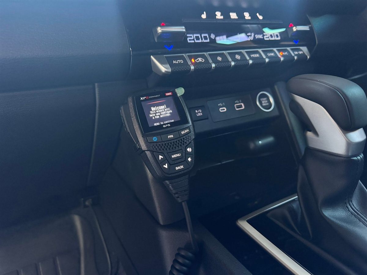 GME XRS Connect UHF handset mounted under the climate controls