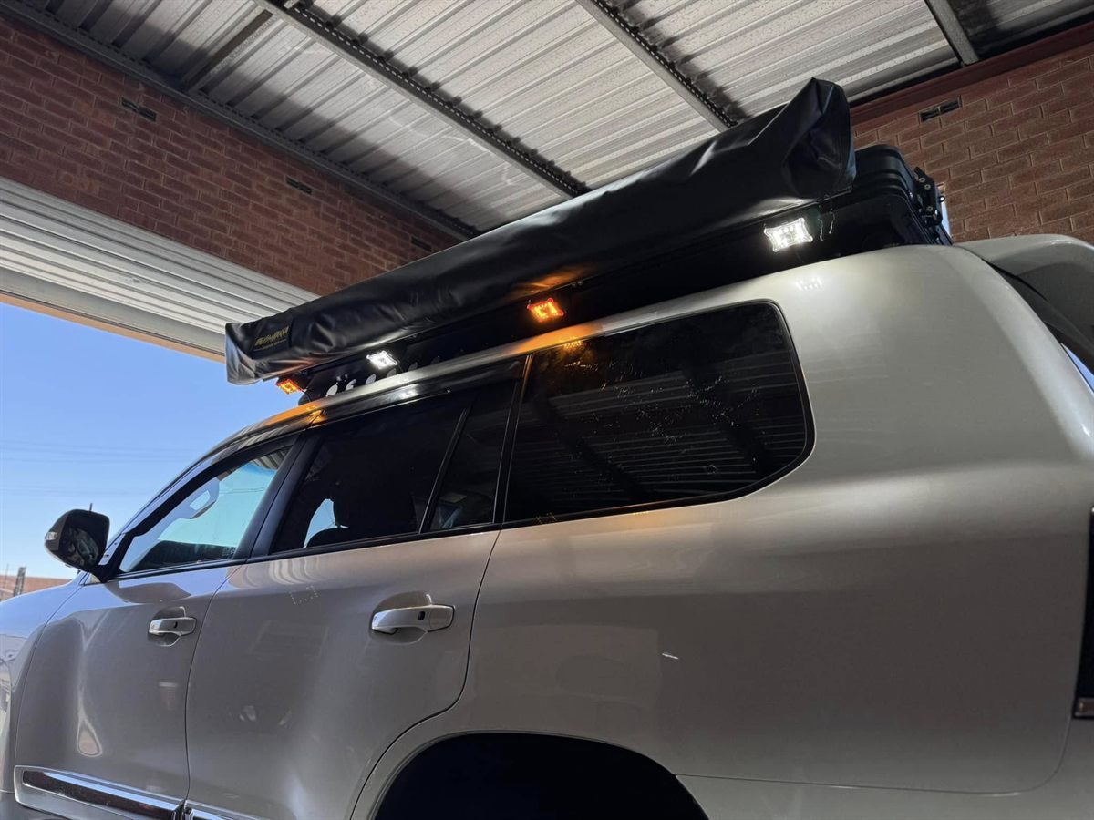 LandCruiser with roof-rack awning and camp lighting fitted by Prospark