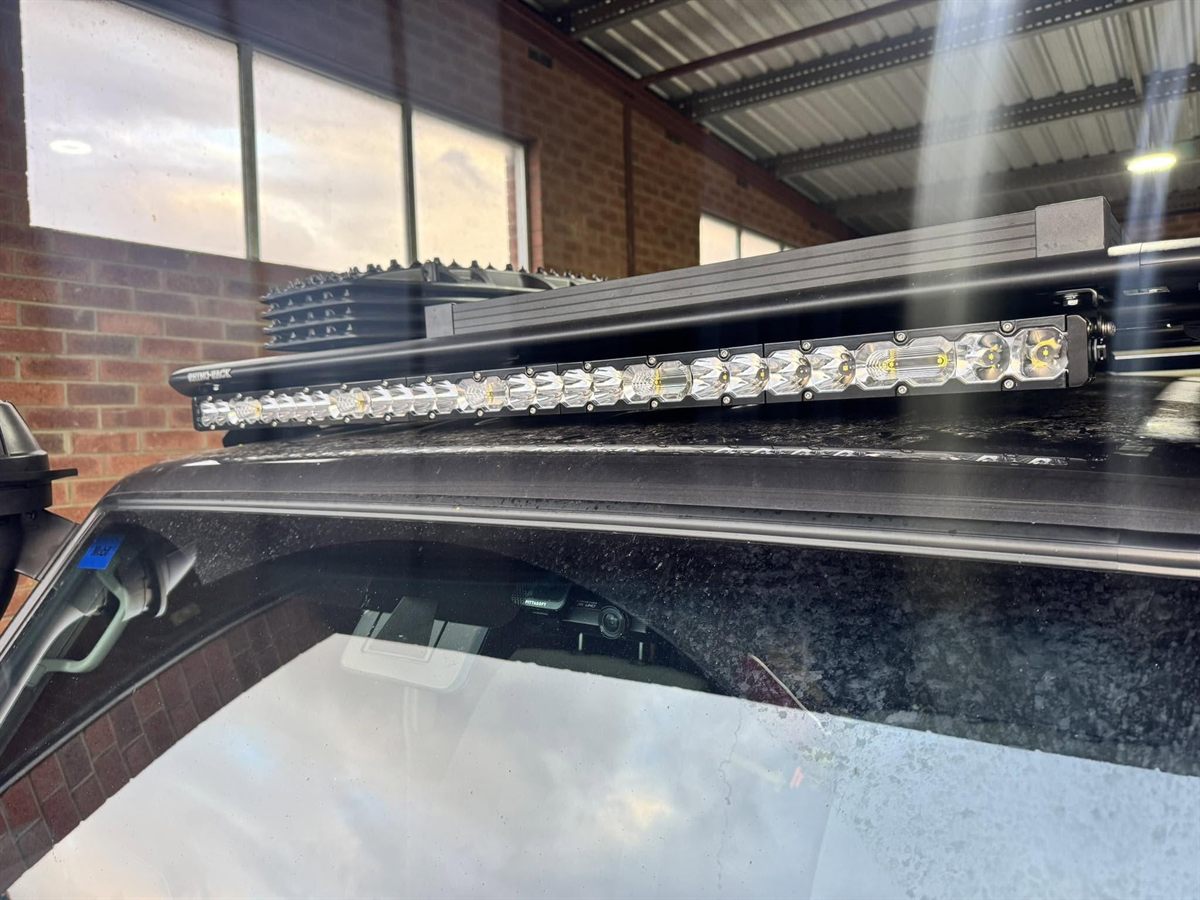 LED light bar mounted under a Rhino-Rack roof rack