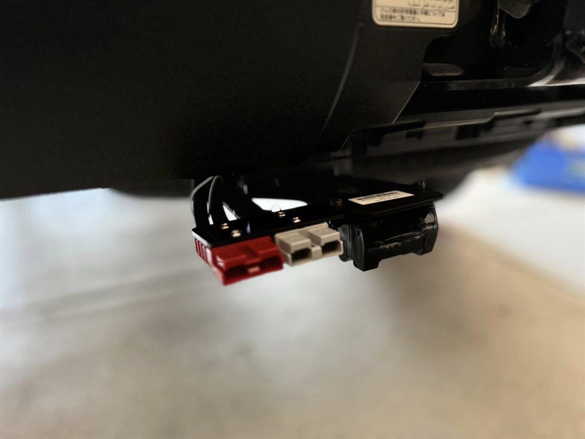 Anderson plugs and trailer socket wired under the rear of a 4WD