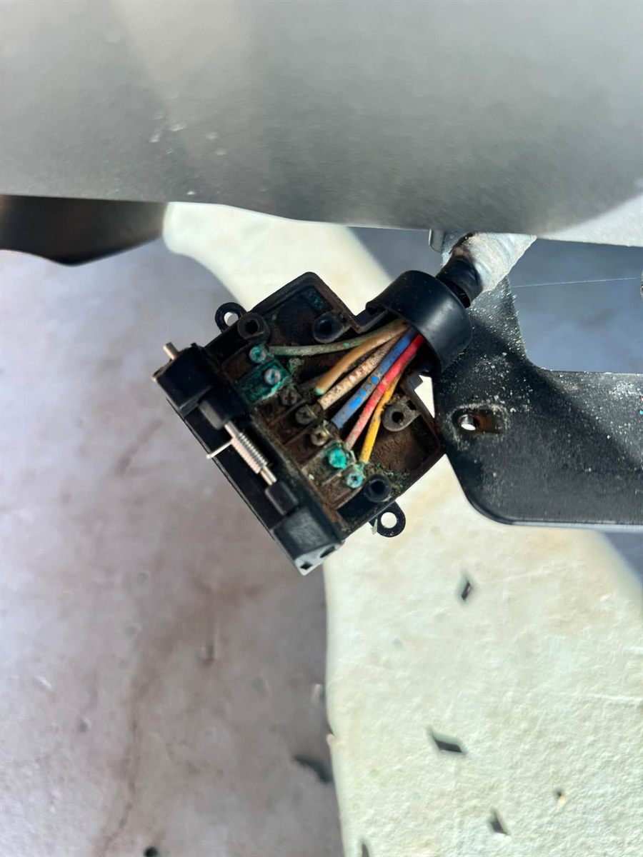 Trailer plug wiring being repaired