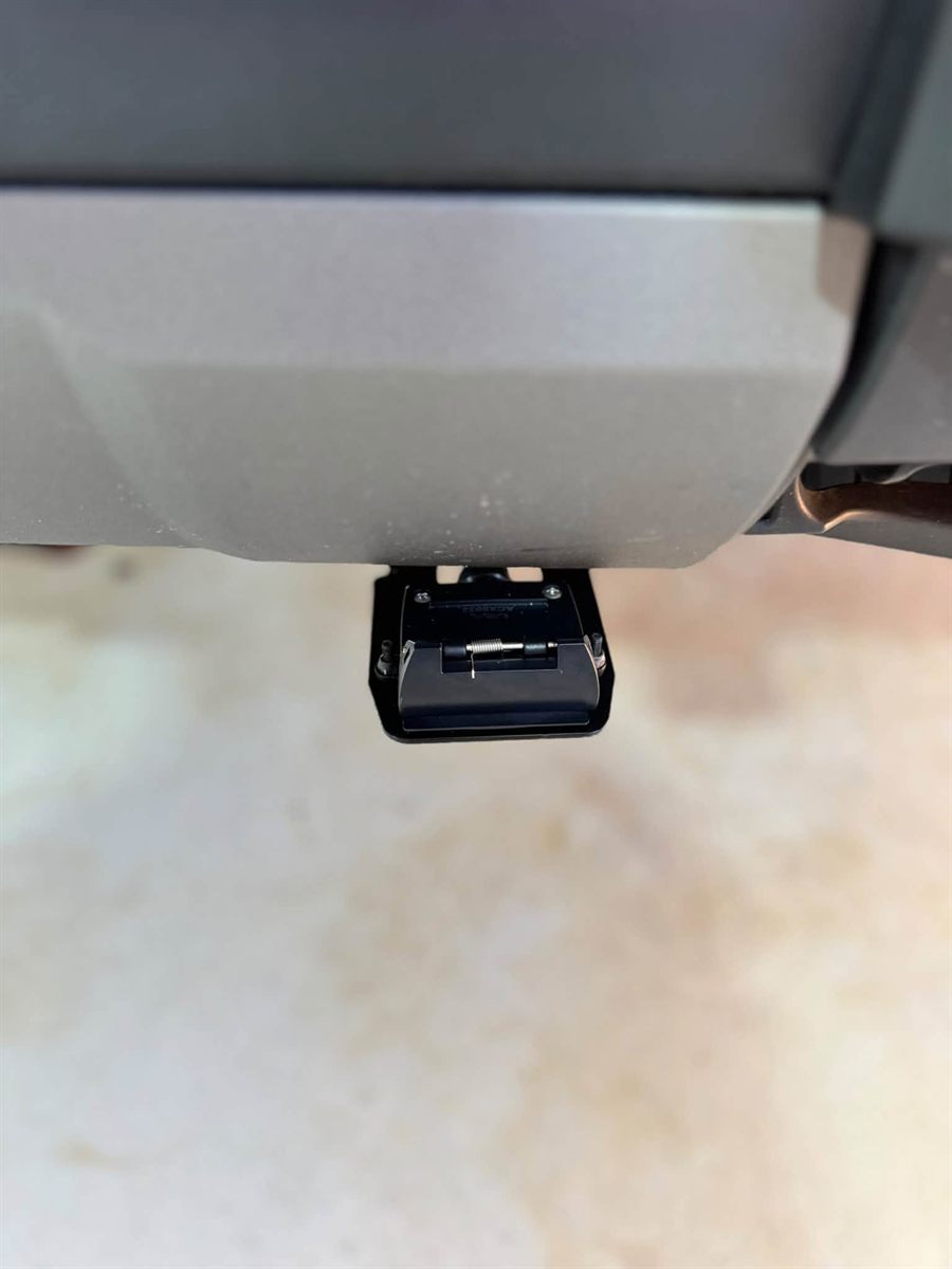 Trailer socket mounted under the rear bumper